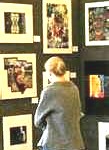 a looker looking at some picture/paintings