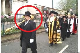 a ace bearer leading Lord Mayor's procession