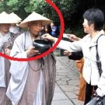 Buddhist mendicants accepting alms