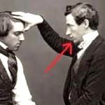 a mesmerist (R) mesmerising a person
