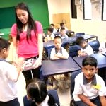 a miss (a teacher) with her pupils