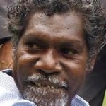 an Australian aborigine's features (Late Actor David Ngoombujarra)