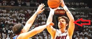 a basketball shooter, shooting the ball into the basket