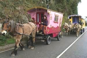 a troupe of travelling showmen on the move in their carrages