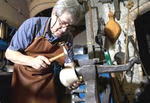 a silversmith at work