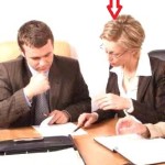 a solicitor (L) explaining legal points to her client