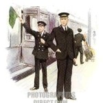 a station master at a platform supervising a train depature