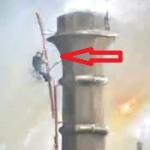 a steeplejack on a tall chimny